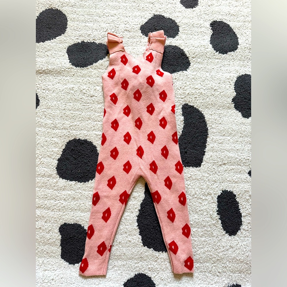 Pink sweater jumpsuit with ruffle straps